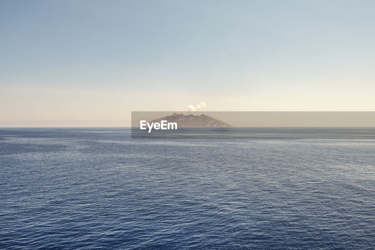 Landscape of montecristo island lost in the italian sea on a beautiful day with clear sky