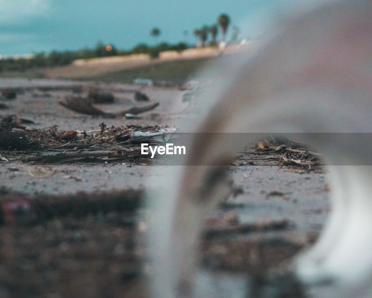 CLOSE-UP OF WATER SURFACE LEVEL OF LAND