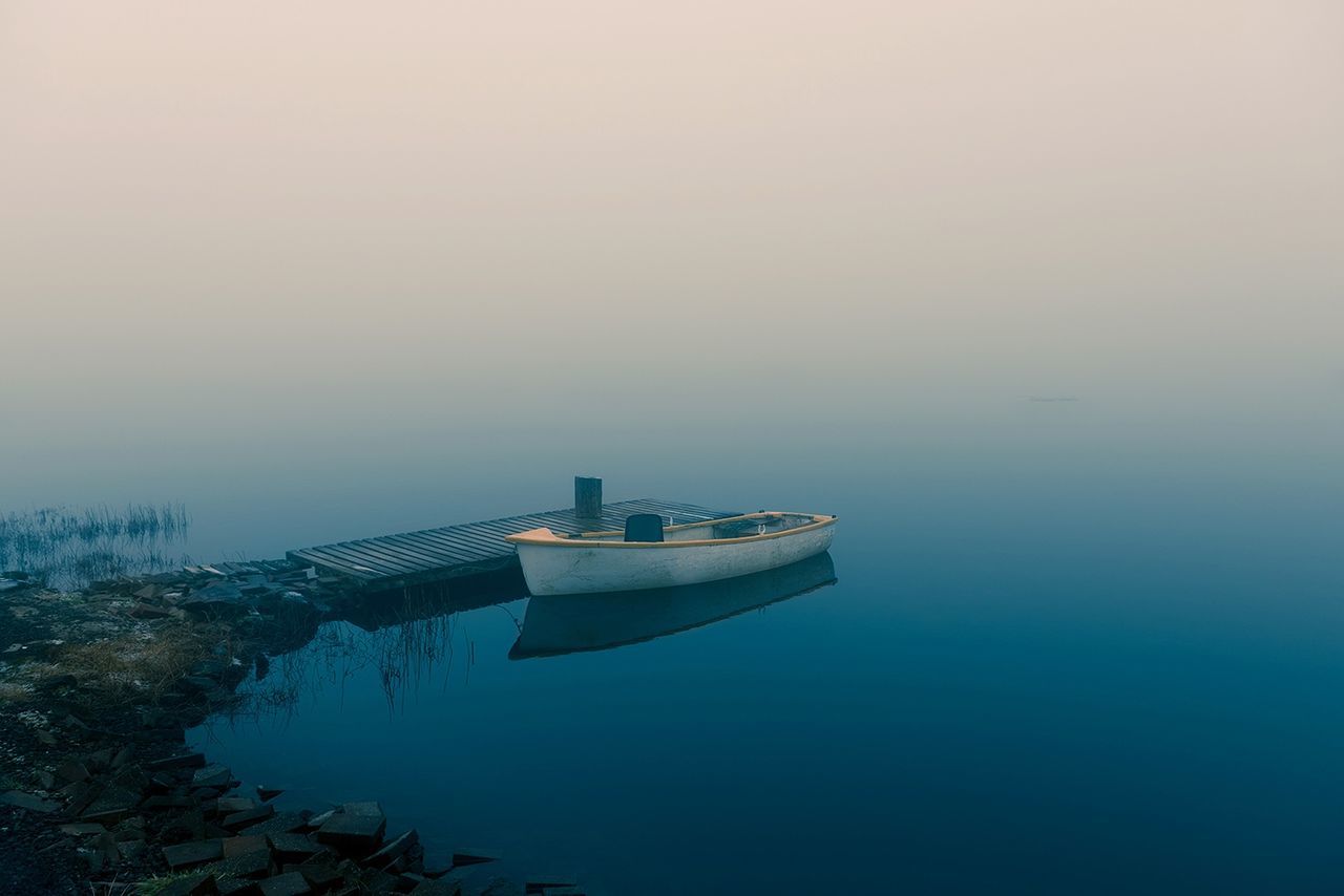 Boat moored on sea