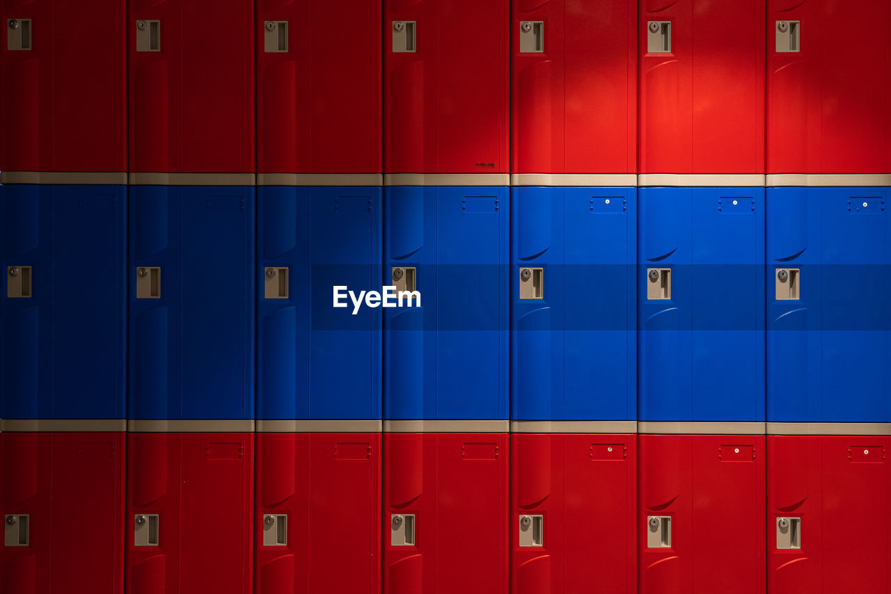Blue and red lockers. horizontal full frame shot