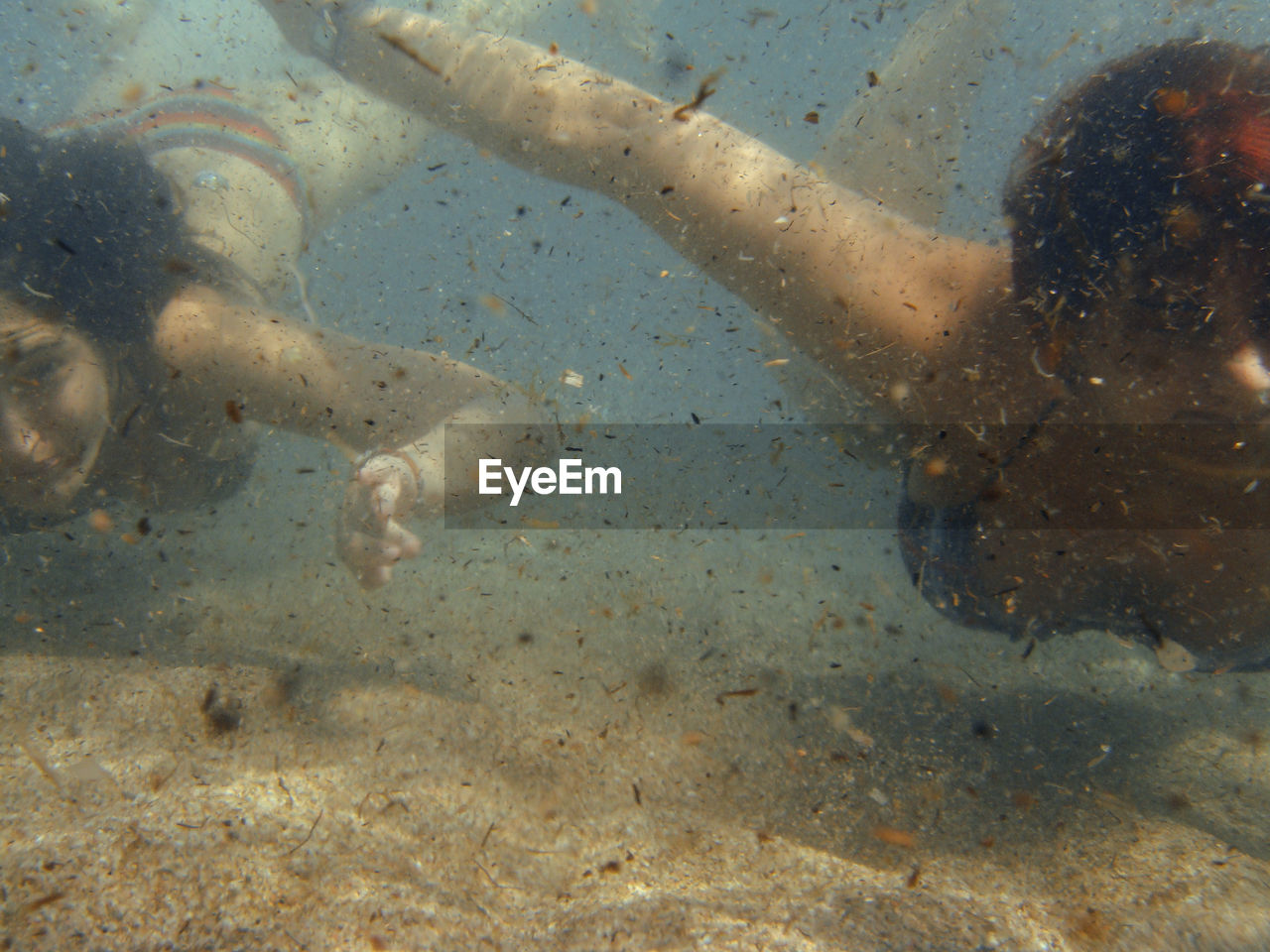 CLOSE-UP OF SWIMMING UNDERWATER