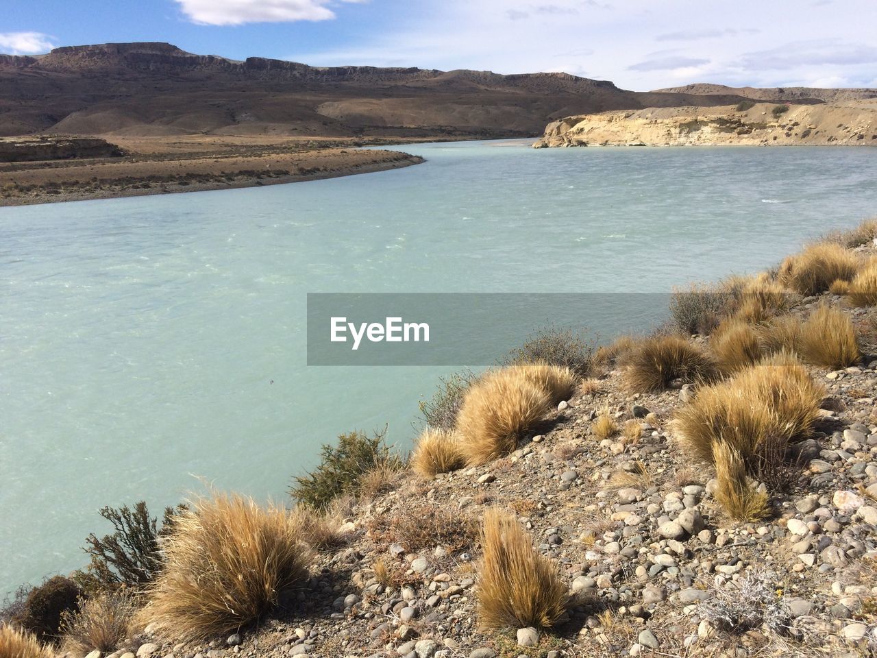 SCENIC VIEW OF SEA AND MOUNTAINS