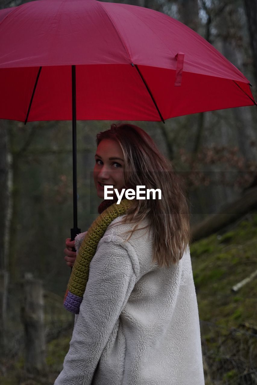 Young woman with umbrella