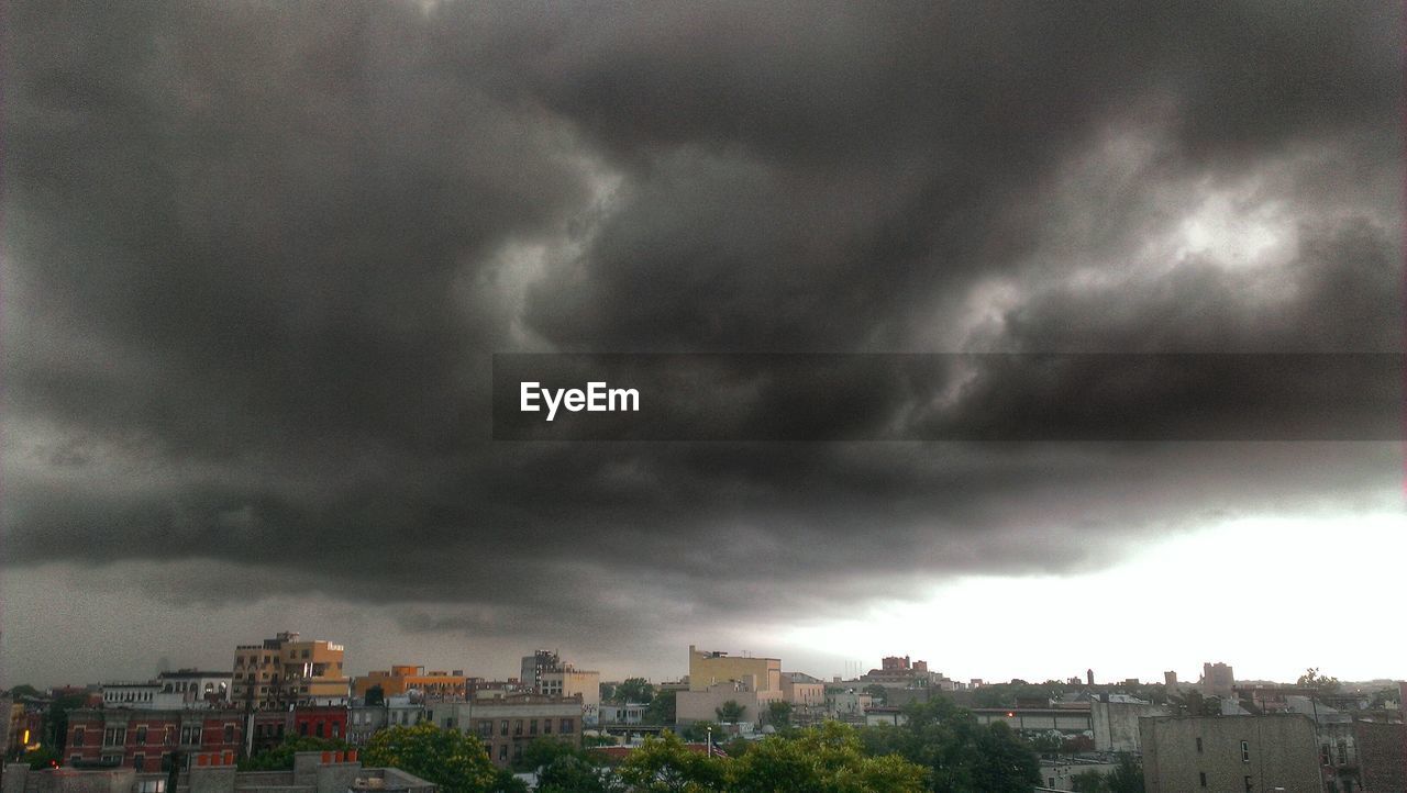 Stormy clouds over cityscape