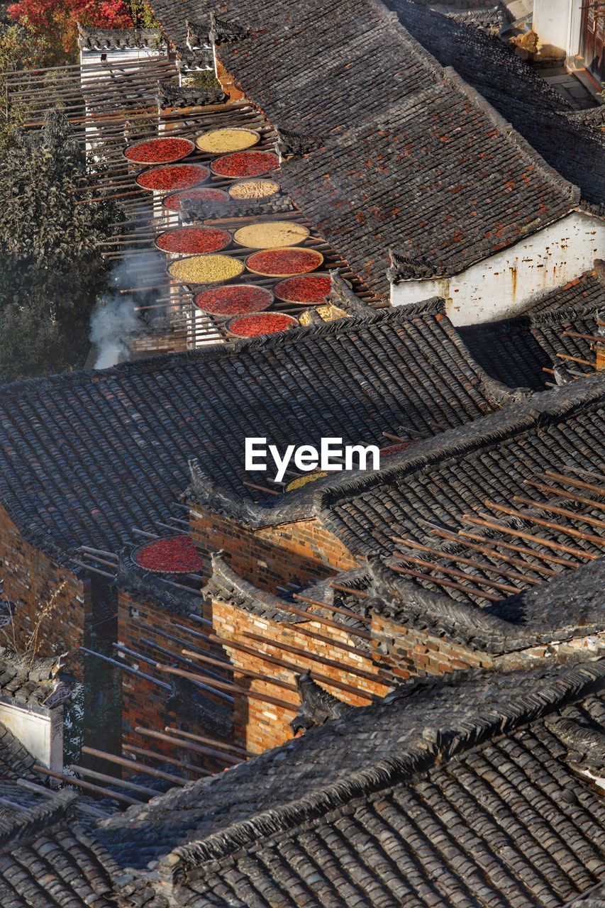 High angle view of food drying on rooftops