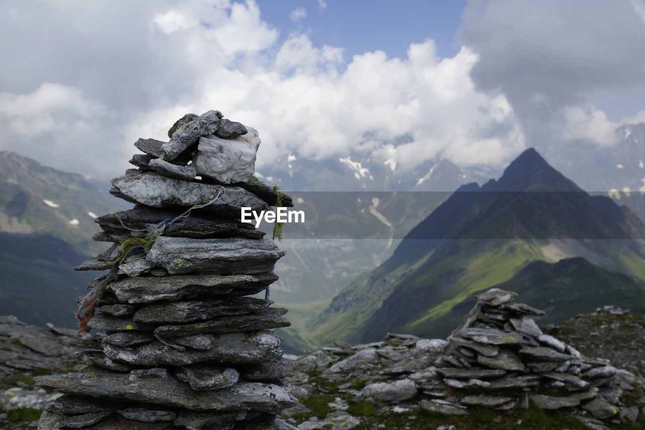 STACK OF ROCKS AGAINST MOUNTAIN