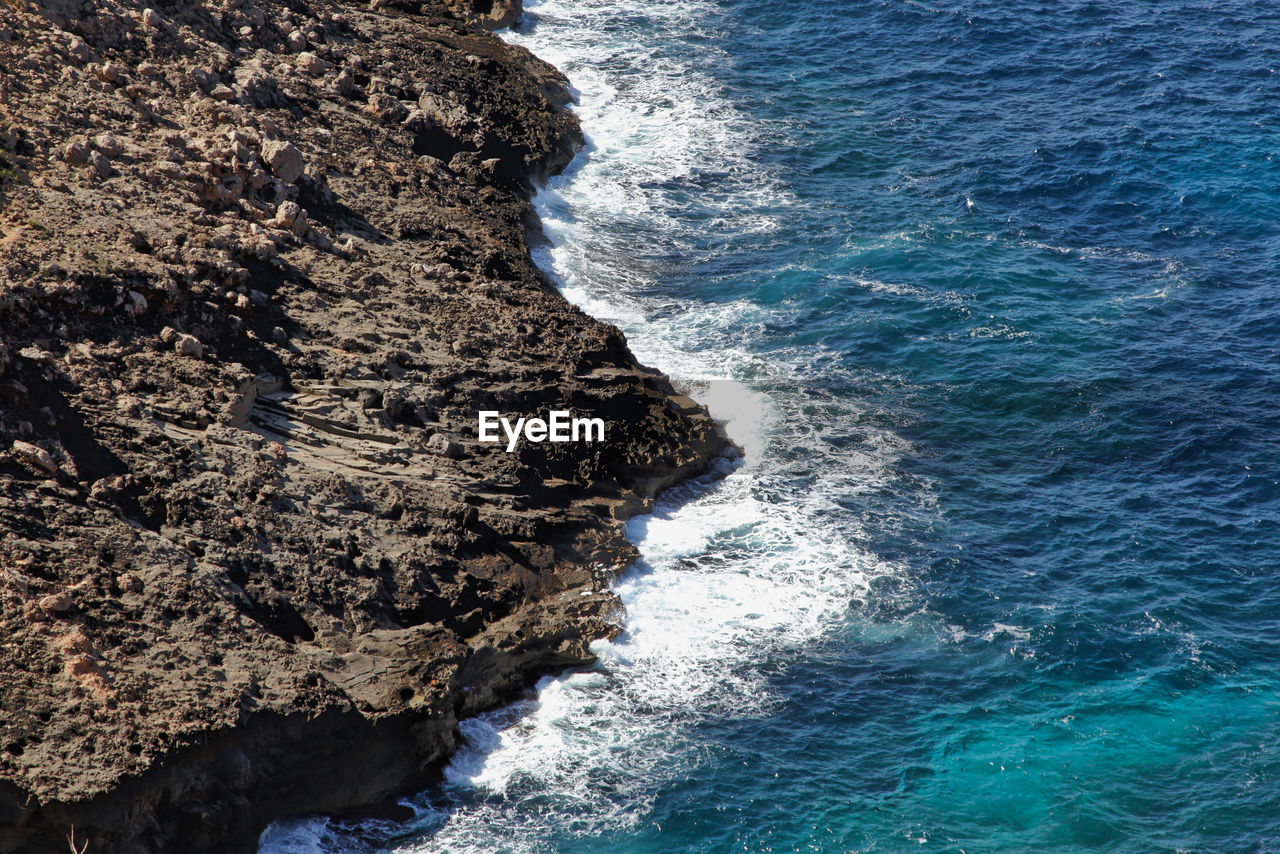 High angle view of sea and coastline 