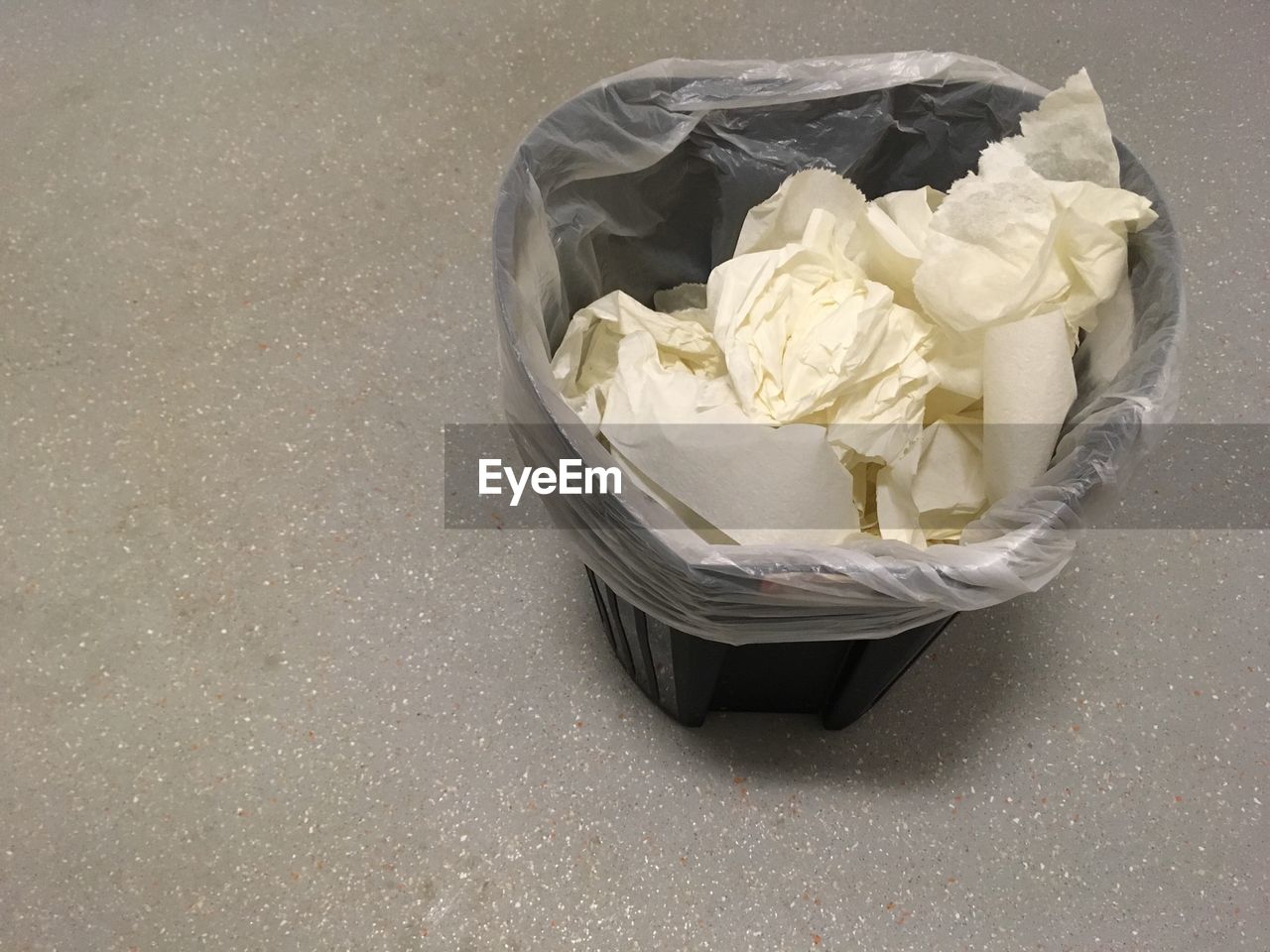 HIGH ANGLE VIEW OF ICE CREAM ON GARBAGE