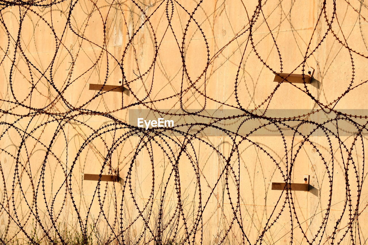 Security metal wire on a protection wall