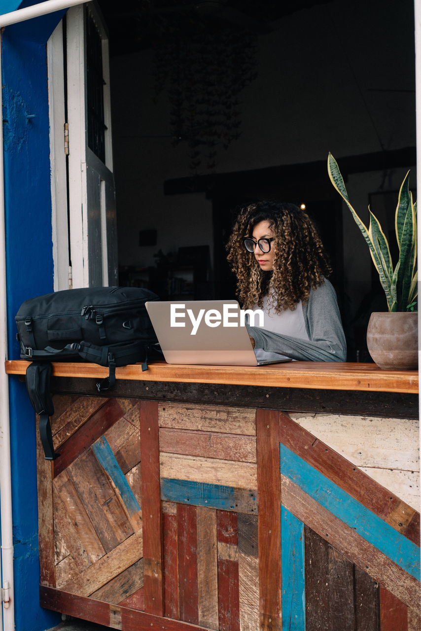 Young woman working on her laptop 