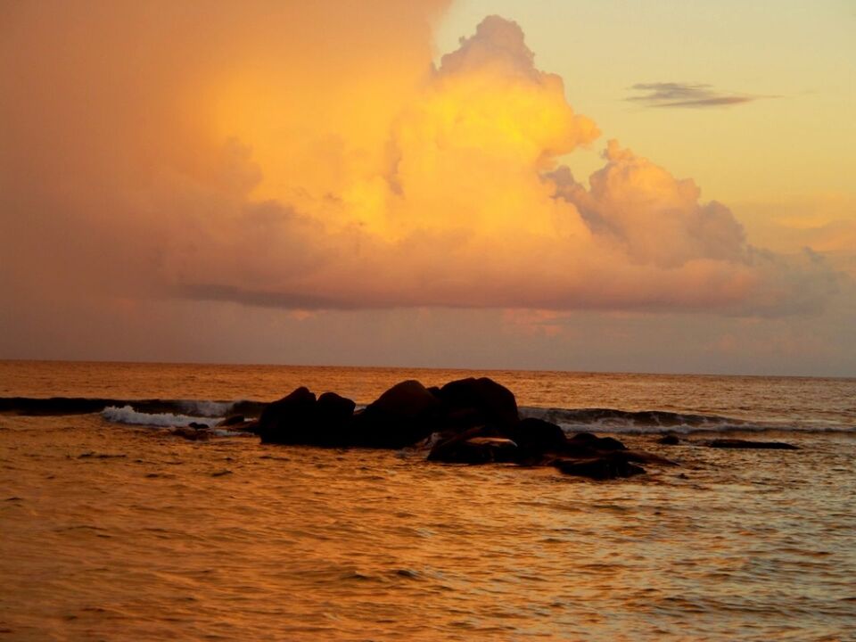 VIEW OF SEA AT SUNSET