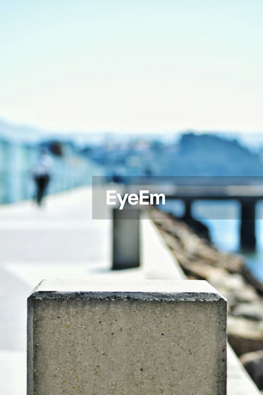 Close-up of bollard on pier