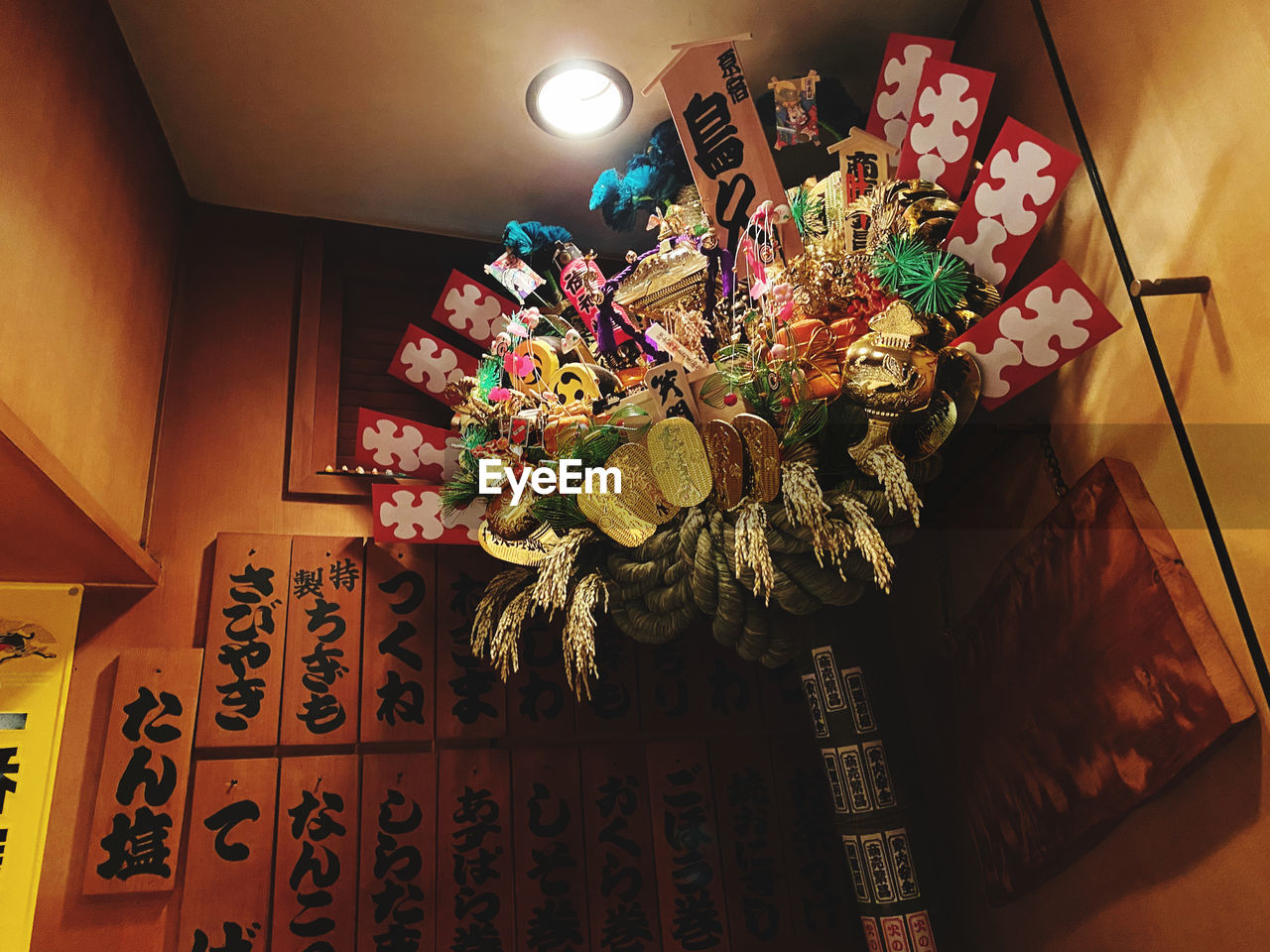 HIGH ANGLE VIEW OF FLOWERING PLANT ON TABLE AT HOME