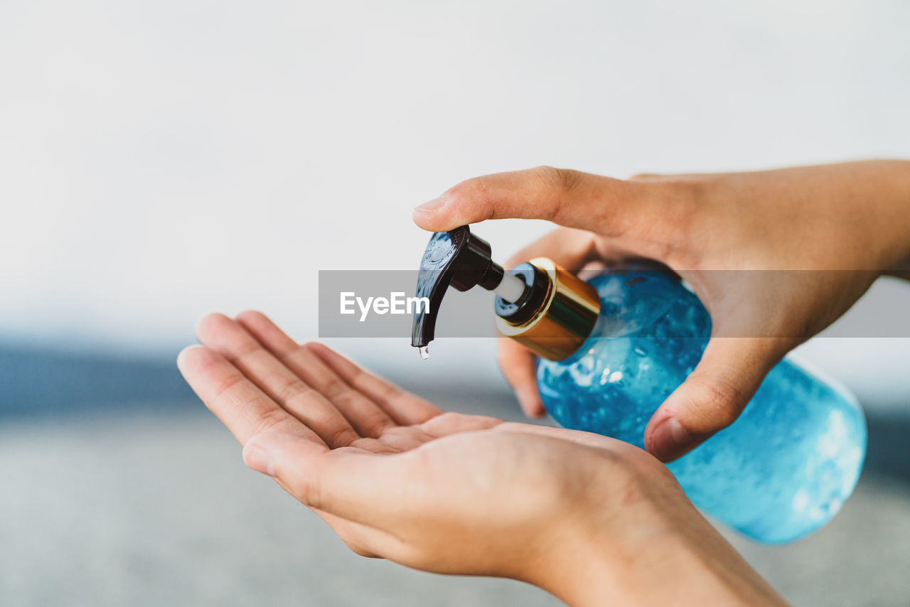 Close-up of person washing hands