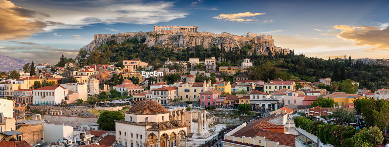 Monastiraki square and plaka against sky during sunset