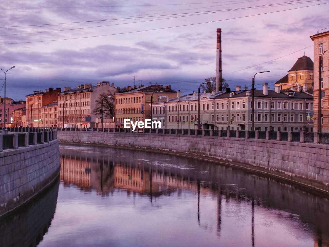 REFLECTION OF BUILDINGS IN WATER