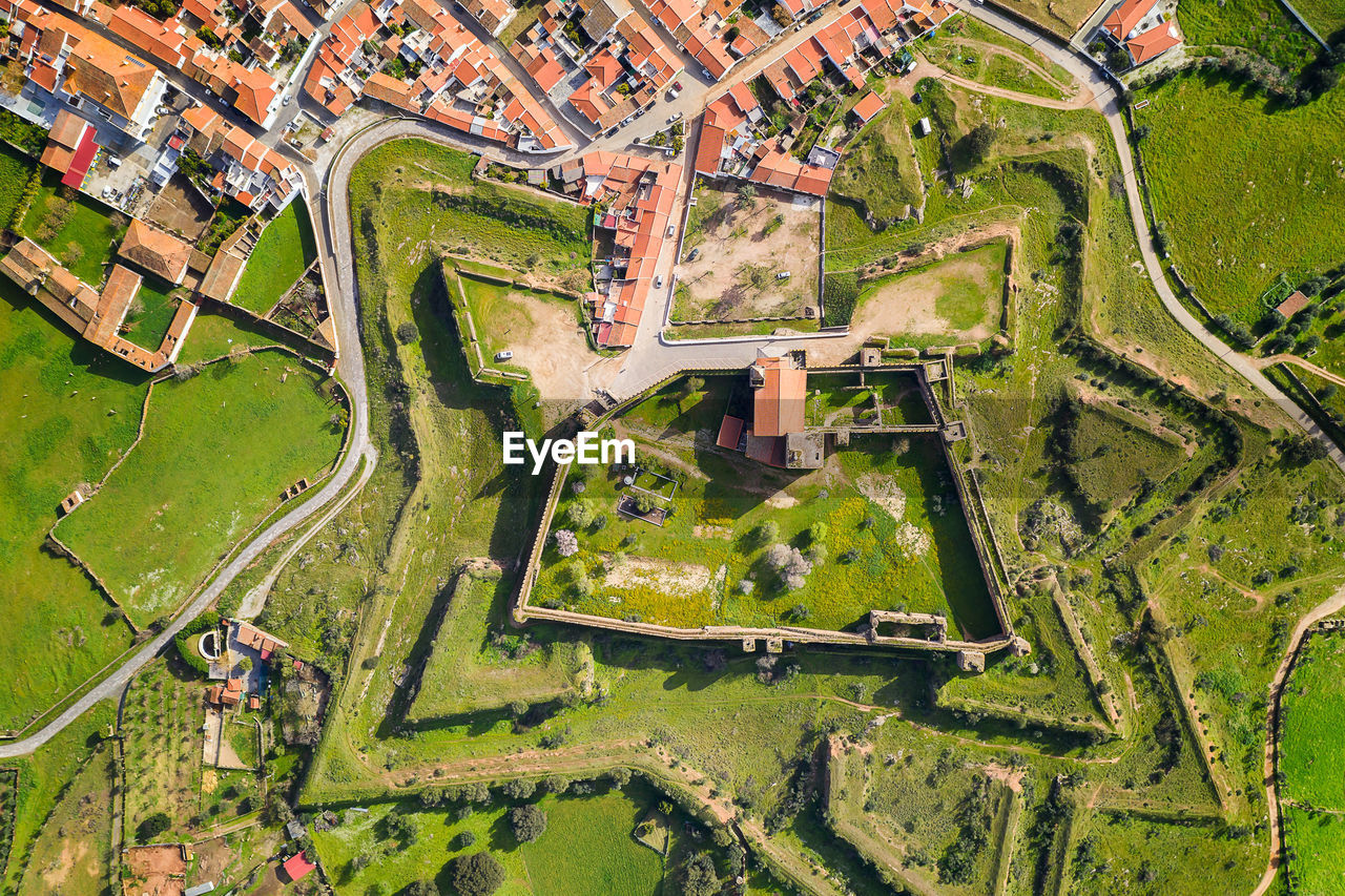 Mourao drone aerial top view of star shapped castle in alentejo, portugal