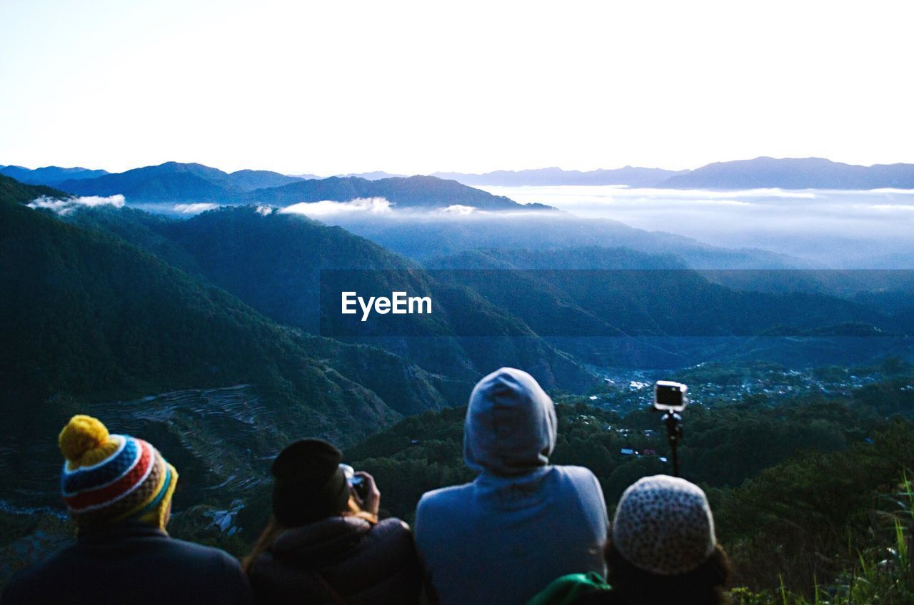 Group of people overlooking landscape