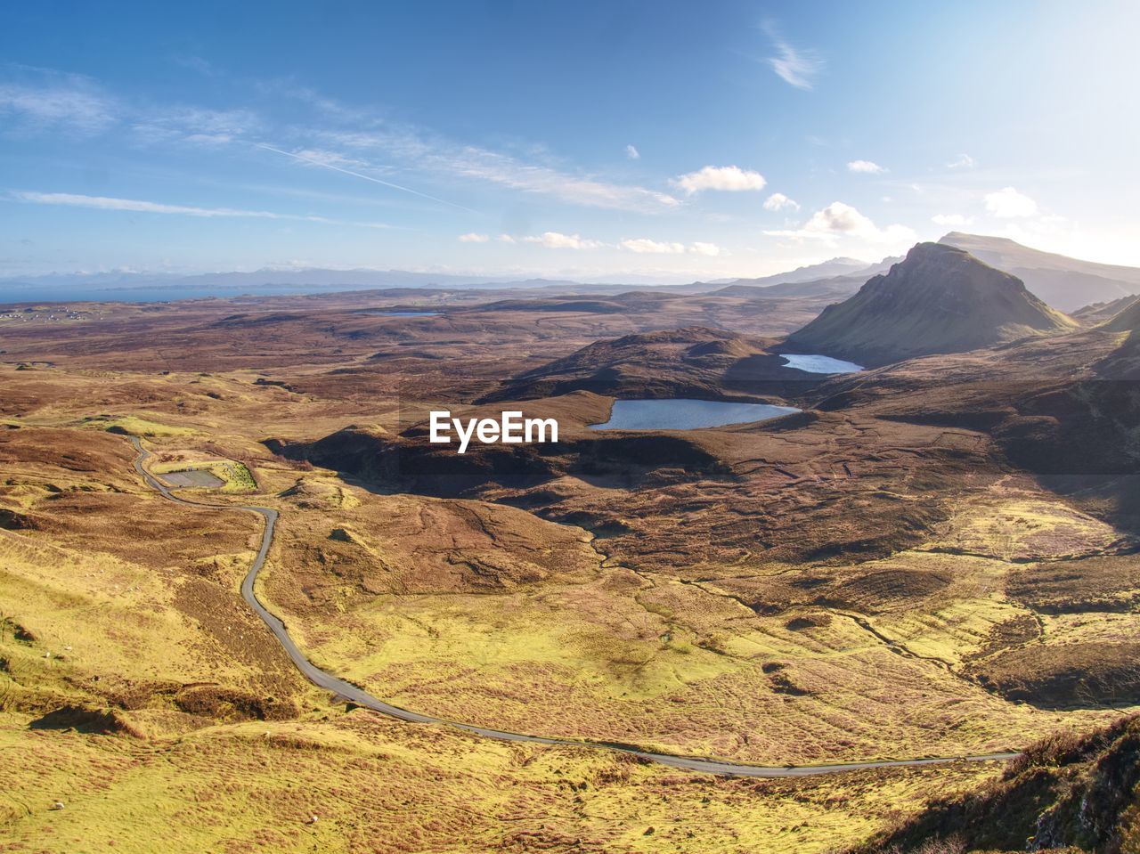 Breathtaking view from quiraing mountains into vallley. sunny day. isle of skye, scottish highlands.