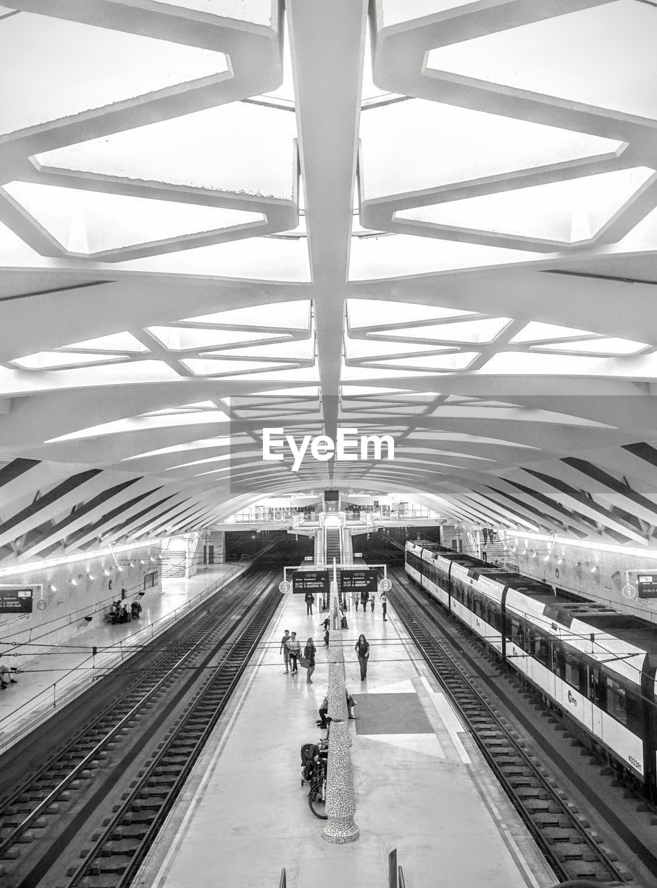 High angle view of people at railroad station