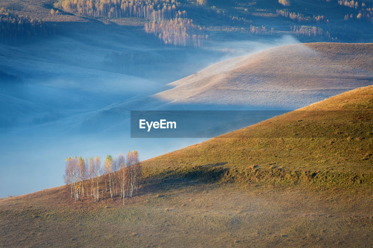 Scenic view of land against sky