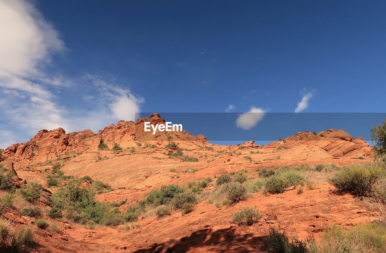 Low angle landscape of red rock formations in red cliffs recreation area in utah