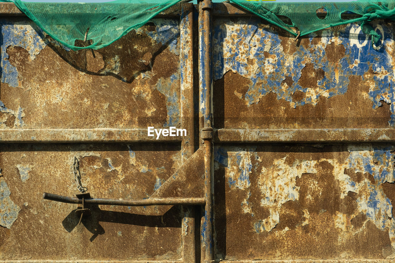 no people, wall, old, day, weathered, metal, full frame, backgrounds, architecture, wood, outdoors, rusty, textured, close-up, built structure, damaged, wall - building feature, decline, abandoned, pattern, deterioration, iron, rundown, art