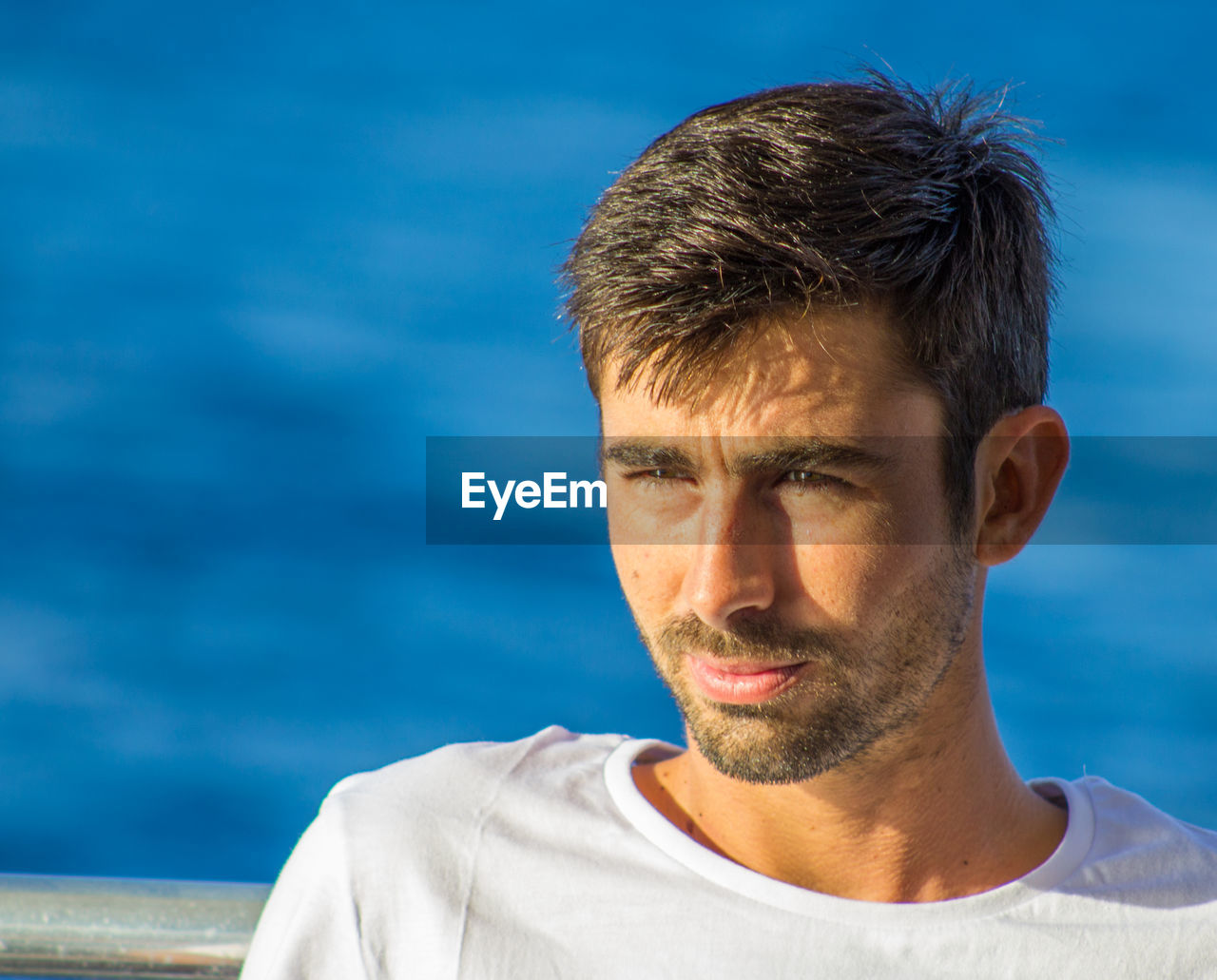 Close-up of young man looking away