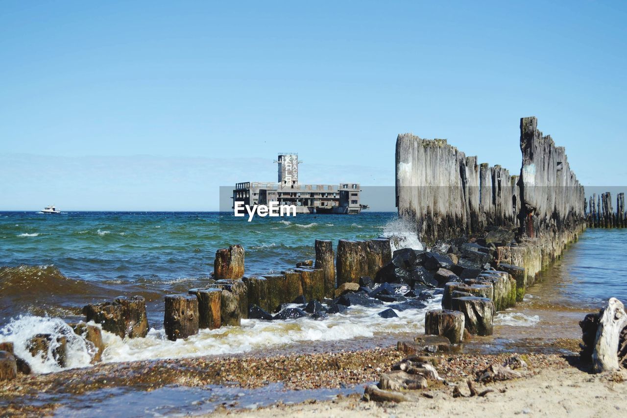 Scenic view of sea against clear sky