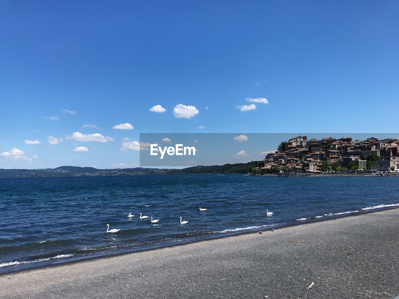 Scenic view of sea against blue sky