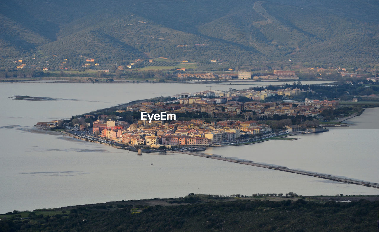 High angle view of lagoon by buildings in city