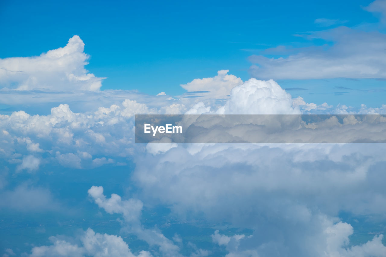 AERIAL VIEW OF CLOUDS OVER LANDSCAPE