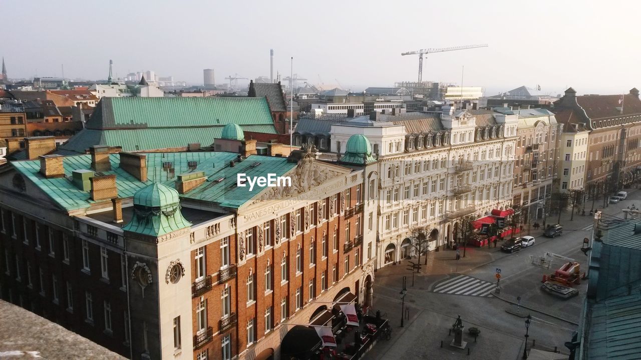 High angle view of buildings against clear sky