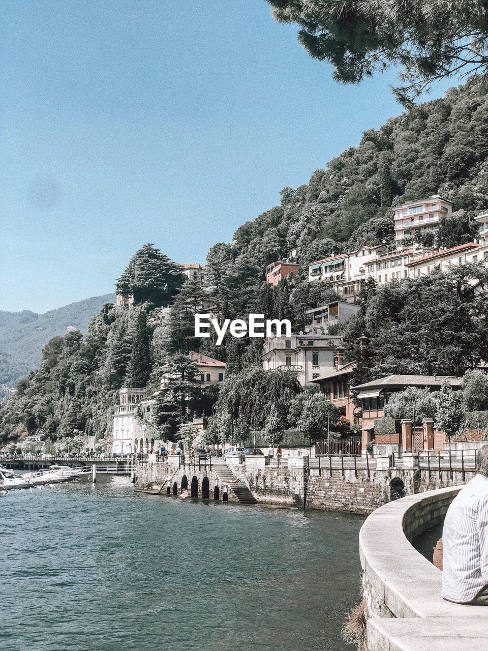 SCENIC VIEW OF SEA BY BUILDINGS AGAINST SKY