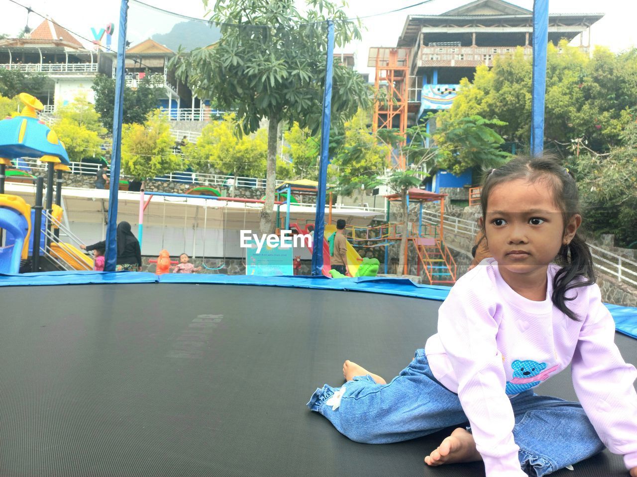 childhood, child, female, one person, women, playground, cute, innocence, happiness, lifestyles, looking at camera, portrait, emotion, day, sitting, smiling, toddler, leisure activity, fun, nature, baby, tree, enjoyment, casual clothing, outdoor play equipment, full length, plant, outdoors, men, front view, architecture, preschool, city