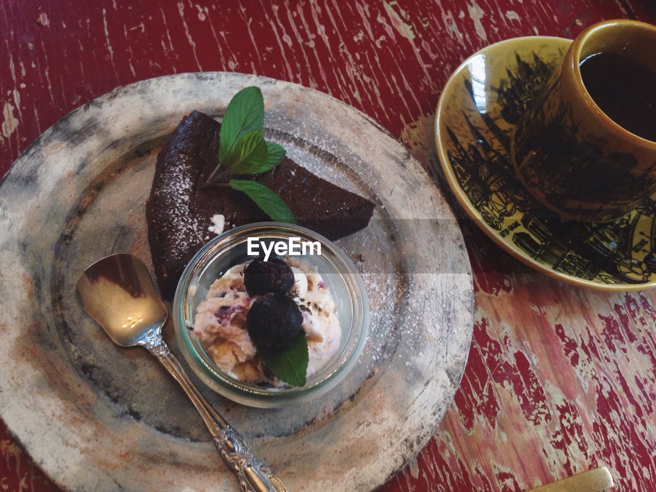 Close-up of dessert with coffee on table