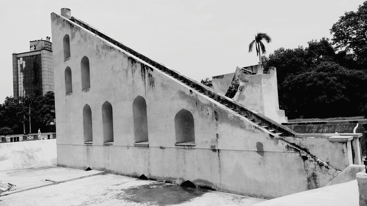 OLD BUILDING AGAINST CLEAR SKY