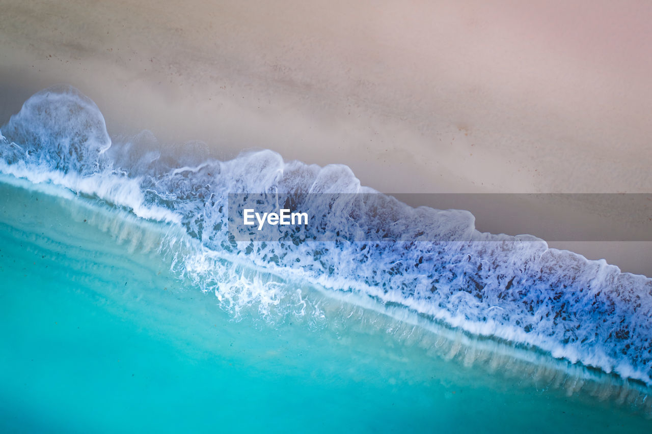 CLOSE-UP OF SWIMMING POOL IN SEA