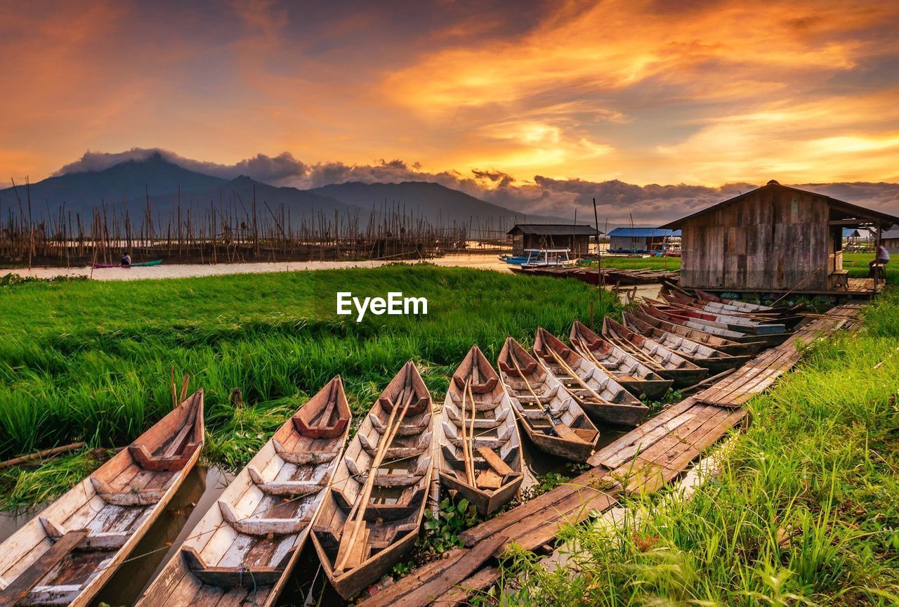 PANORAMIC SHOT OF BUILT STRUCTURE ON SHORE AGAINST SKY