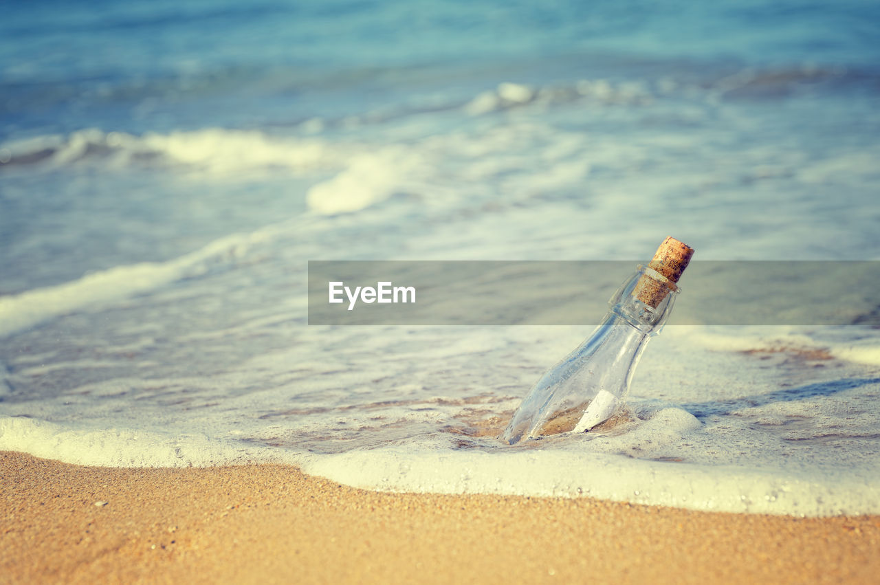 Wish bottle on shore at beach