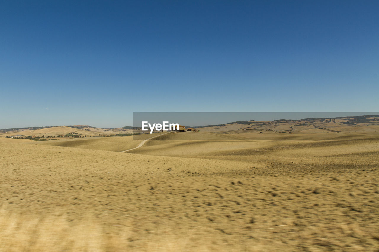 VIEW OF DESERT AGAINST CLEAR SKY