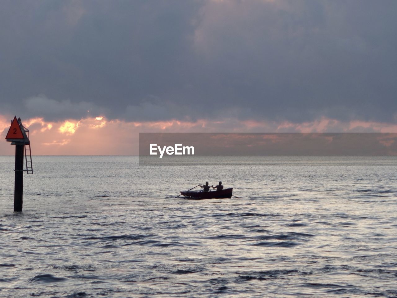 Scenic view of sea against sky during sunrise