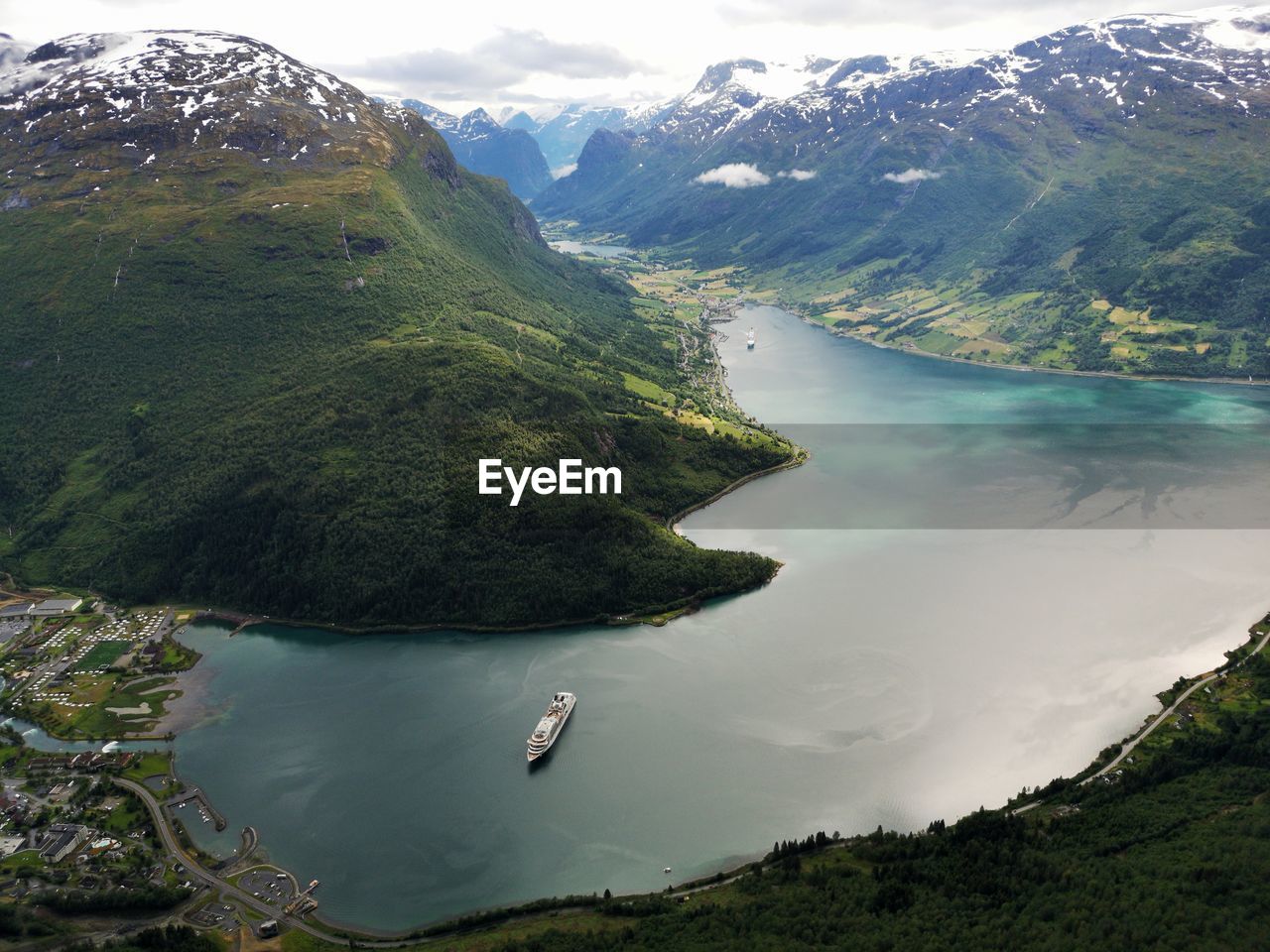 High angle view of lake amidst mountains