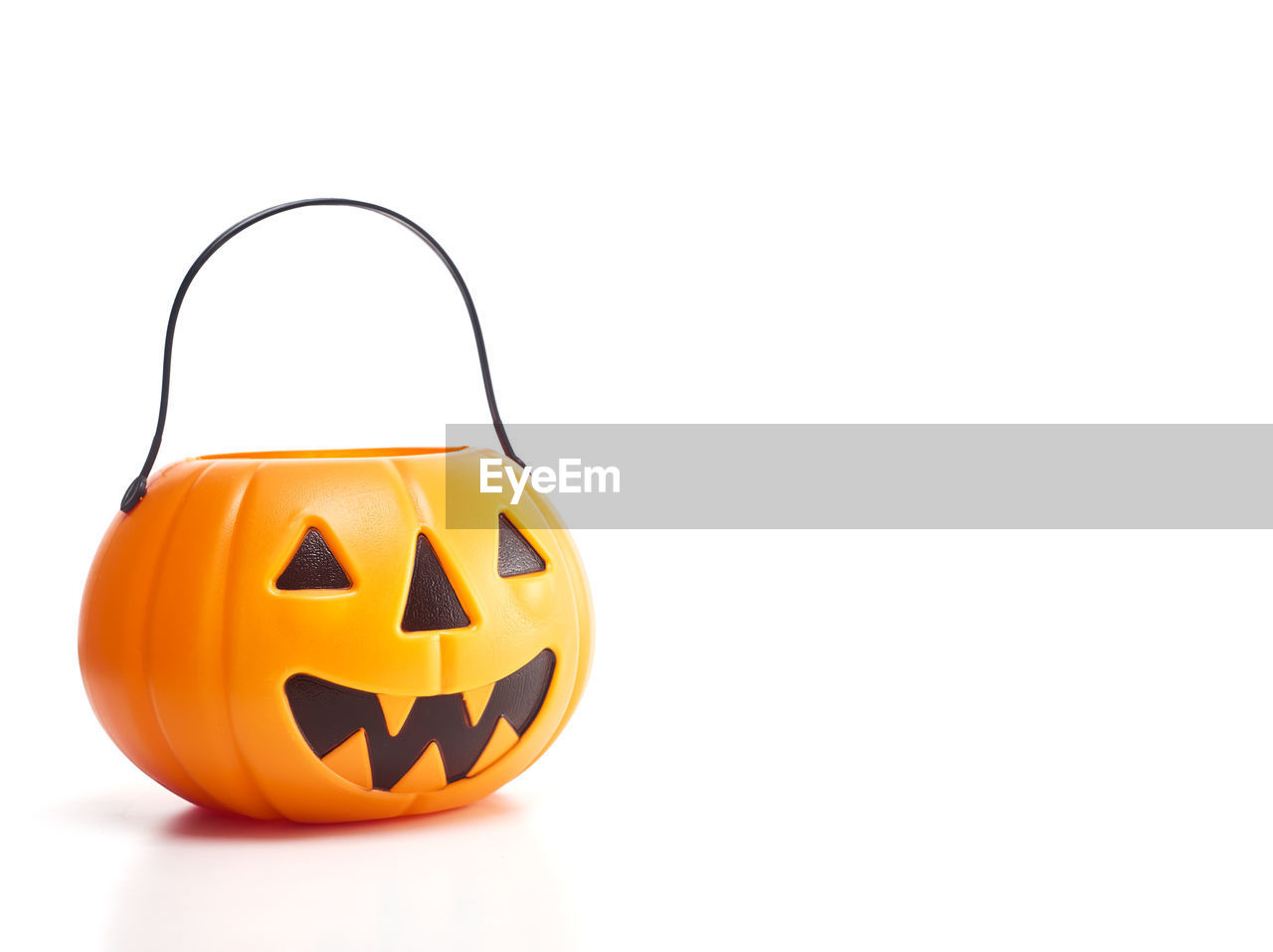 Close-up of jack o lantern against white background