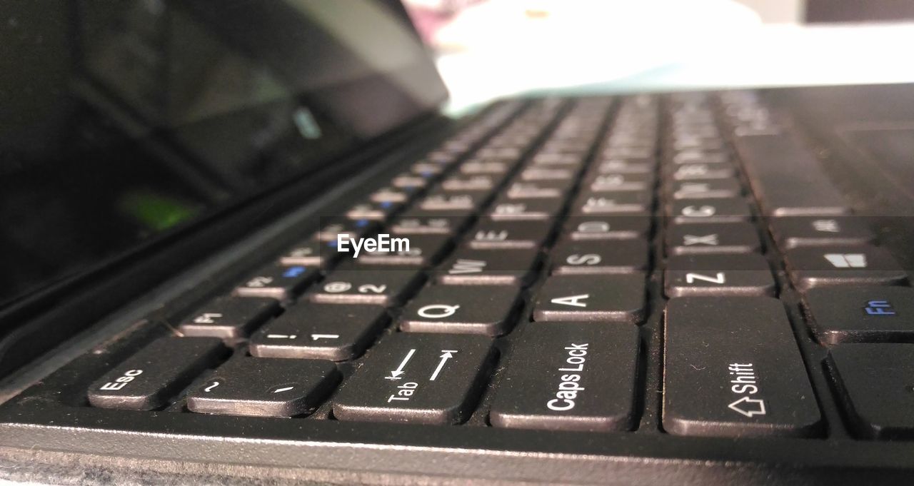 CLOSE-UP OF KEYBOARD OF COMPUTER