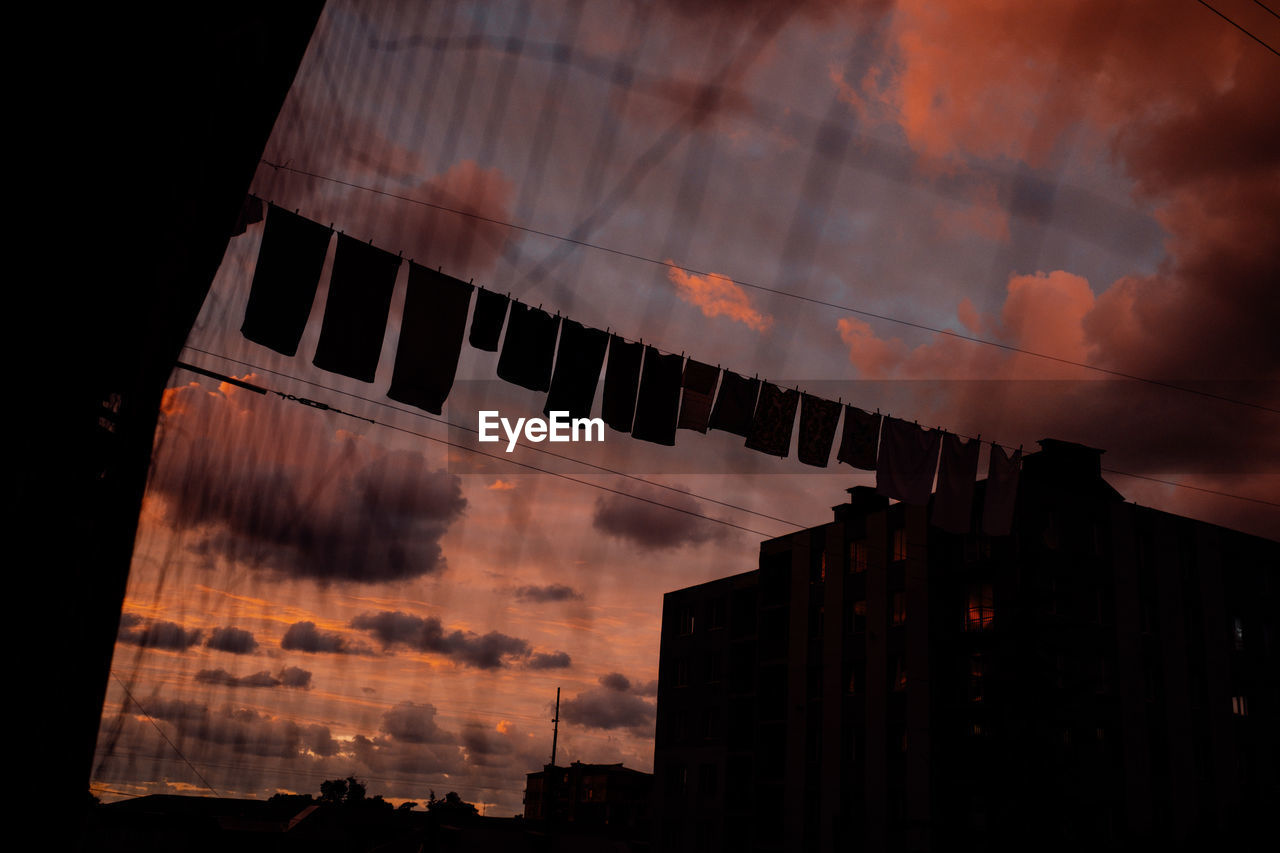 Laundry and linen are dried on a rope outside. wash. environmental friendliness. high quality photo