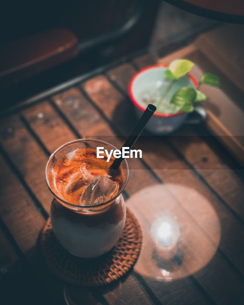 CLOSE-UP OF COFFEE ON TABLE