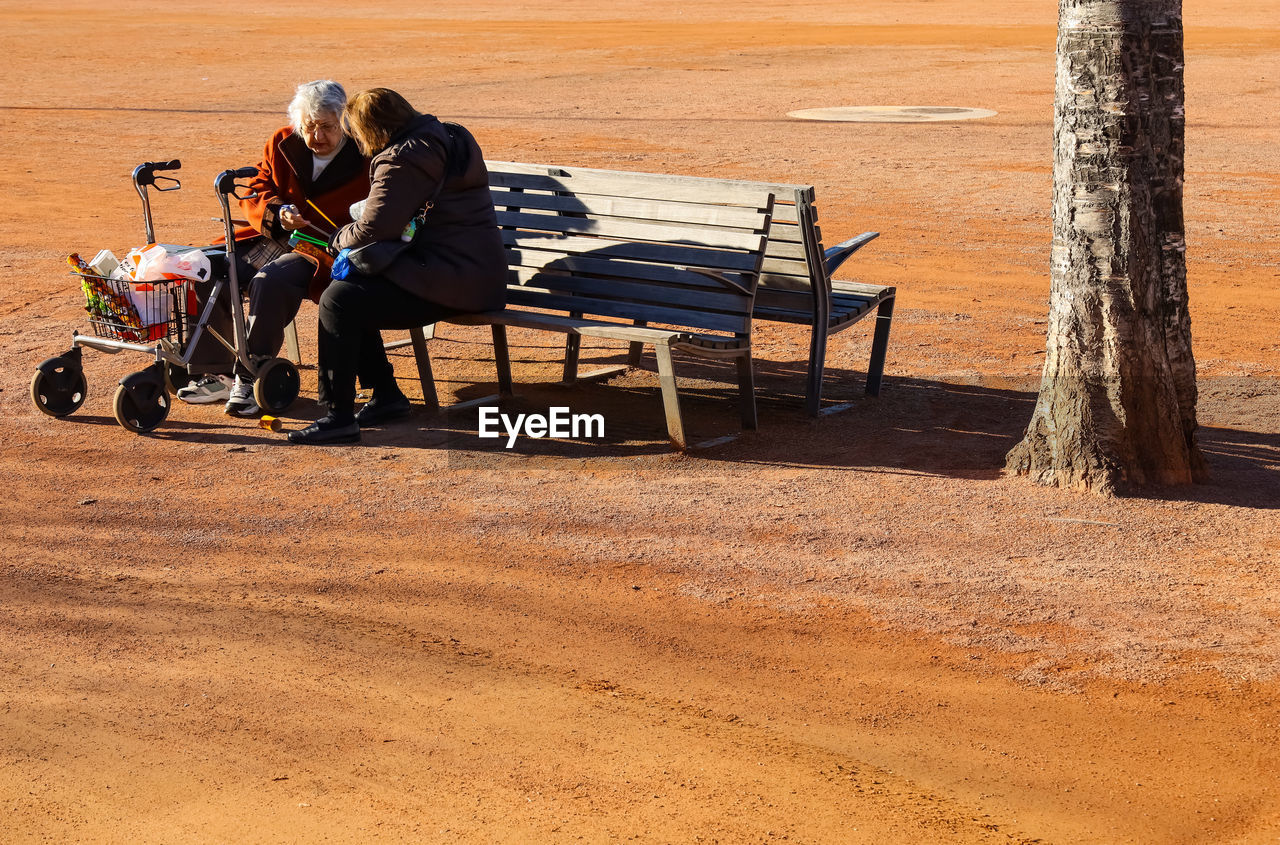 People sitting on bench