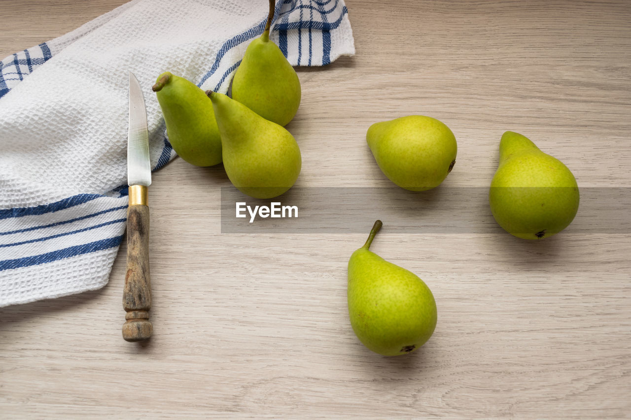 Fresh pears on a wooden table