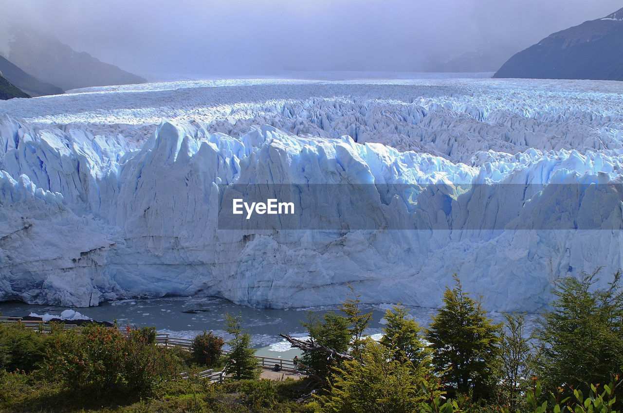 Scenic view of glaciers perito moreno against cloudy sky, patagonia argentina